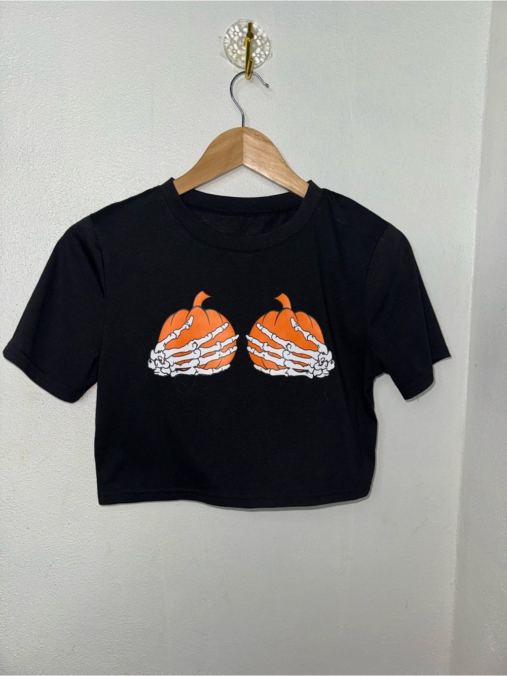 SHEIN Black Crop Tee with Orange Pumpkin & White Skeleton Hands Graphic